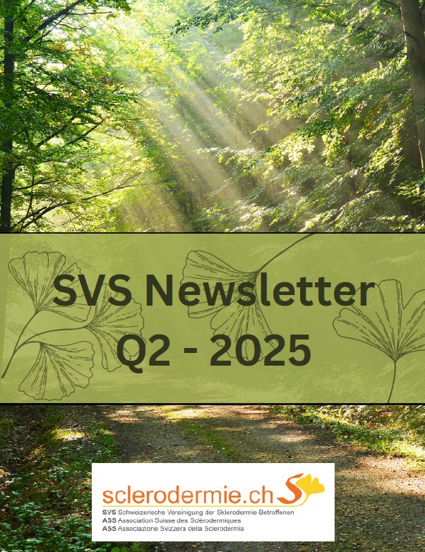 person in black long sleeve shirt holding babys feet